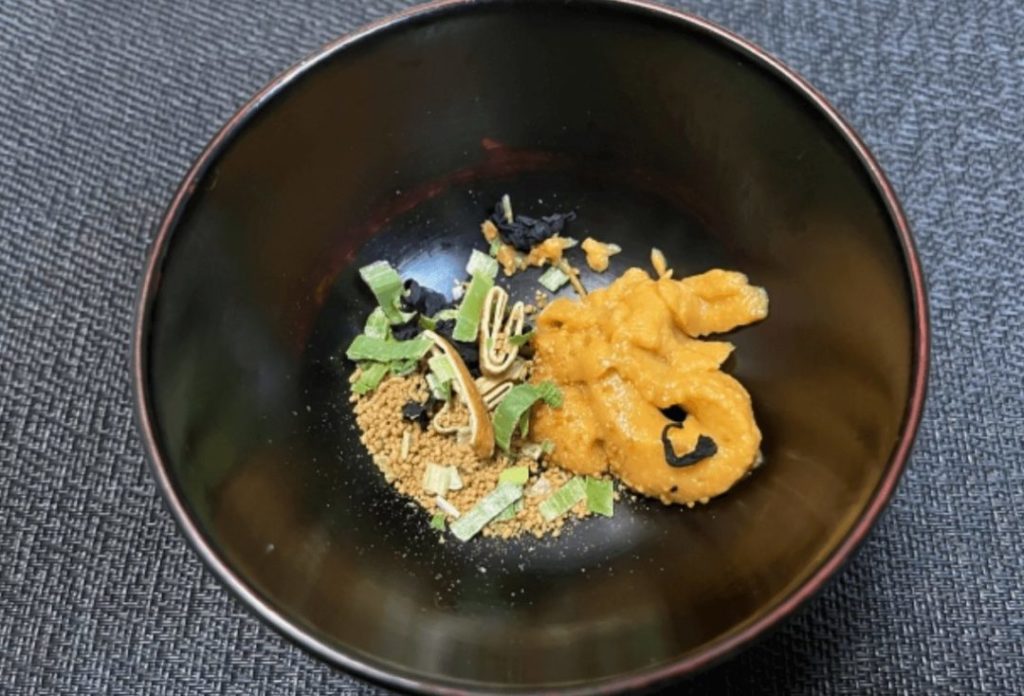 Granulated Japanese soup stock, dried ingredients, and miso for miso soup in a bowl